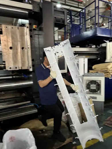 Lifting a long panel out of the mould